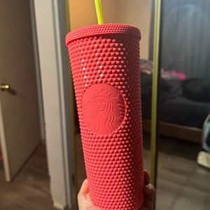 Pink studded Starbucks cup